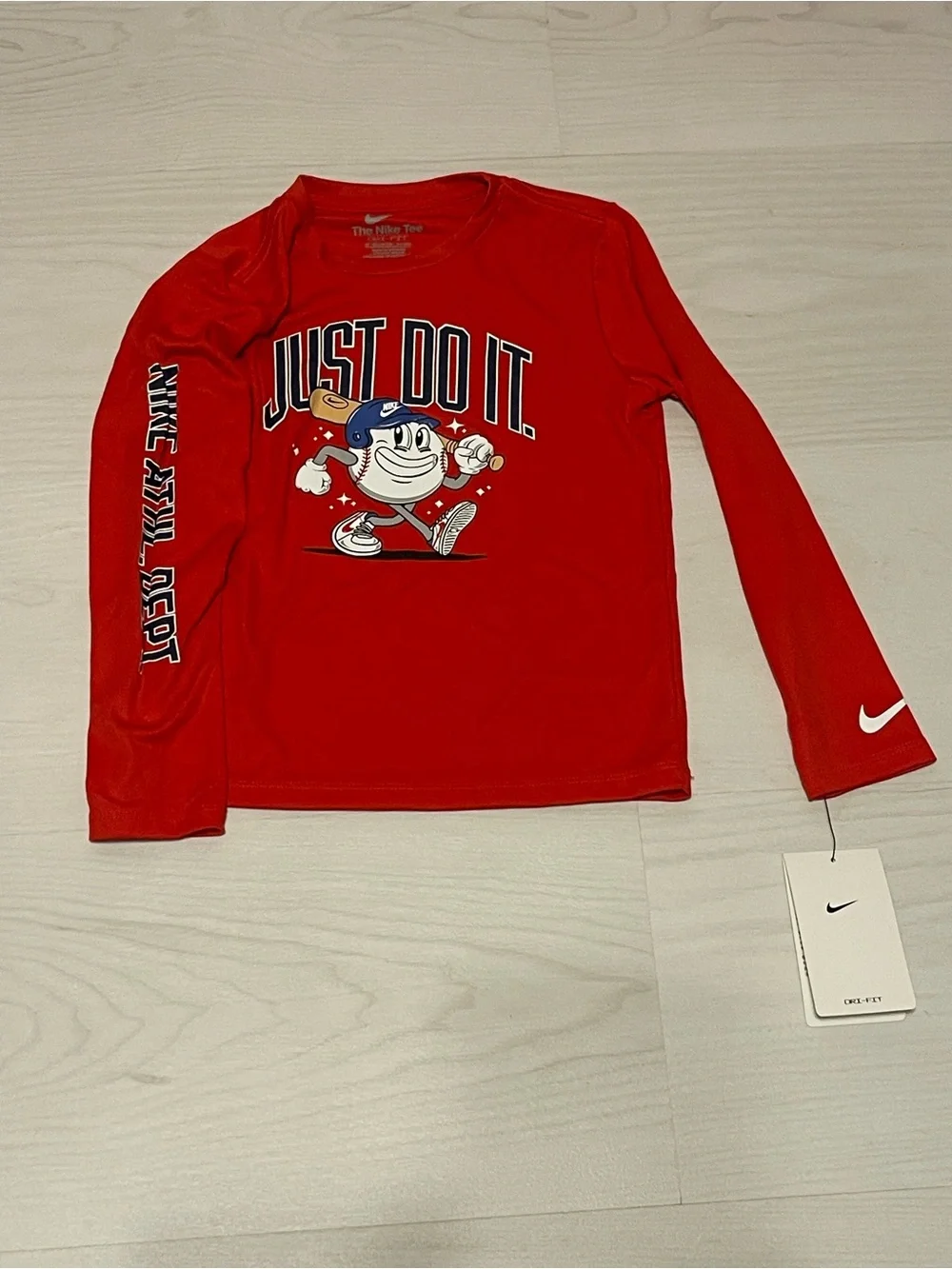 Nike Red Long-Sleeve Kids Dri Fit Tee with 'Just Do It' Character Graphic